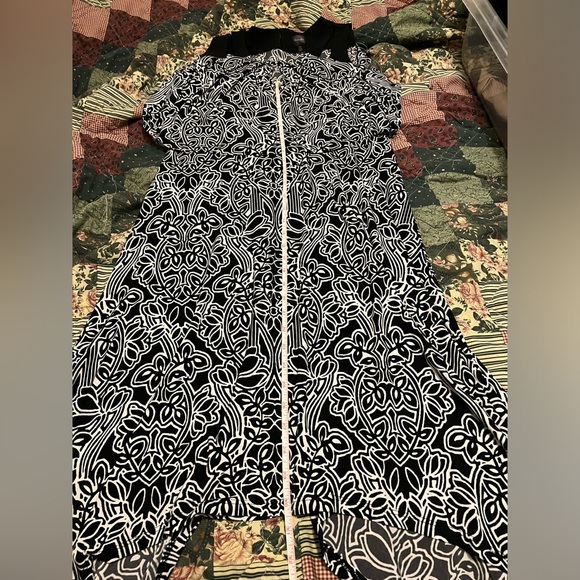 Sleeveless patterned dress with ruffle type top - Picture 13 of 16